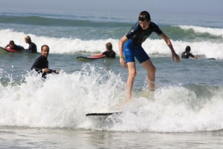 aprender surf con un instructor 